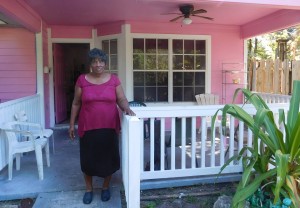 Alyne Harris on the front porch of her home in the Porters community.