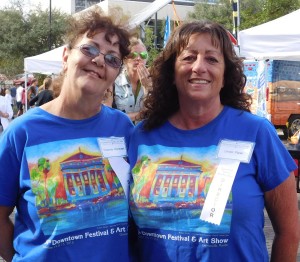 Downtown Festival and Art Show director Linda Piper, right, poses with volunteer Yvonne Norman.