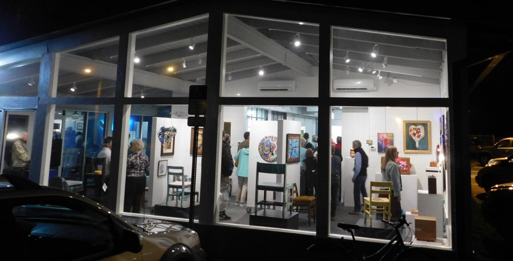 The new GFAA Gallery on South Main Street glows with activity on opening night during Artwalk.