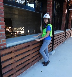 Nathalie McCrate from the CRA in front of the new café space at Bo Diddley Plaza.