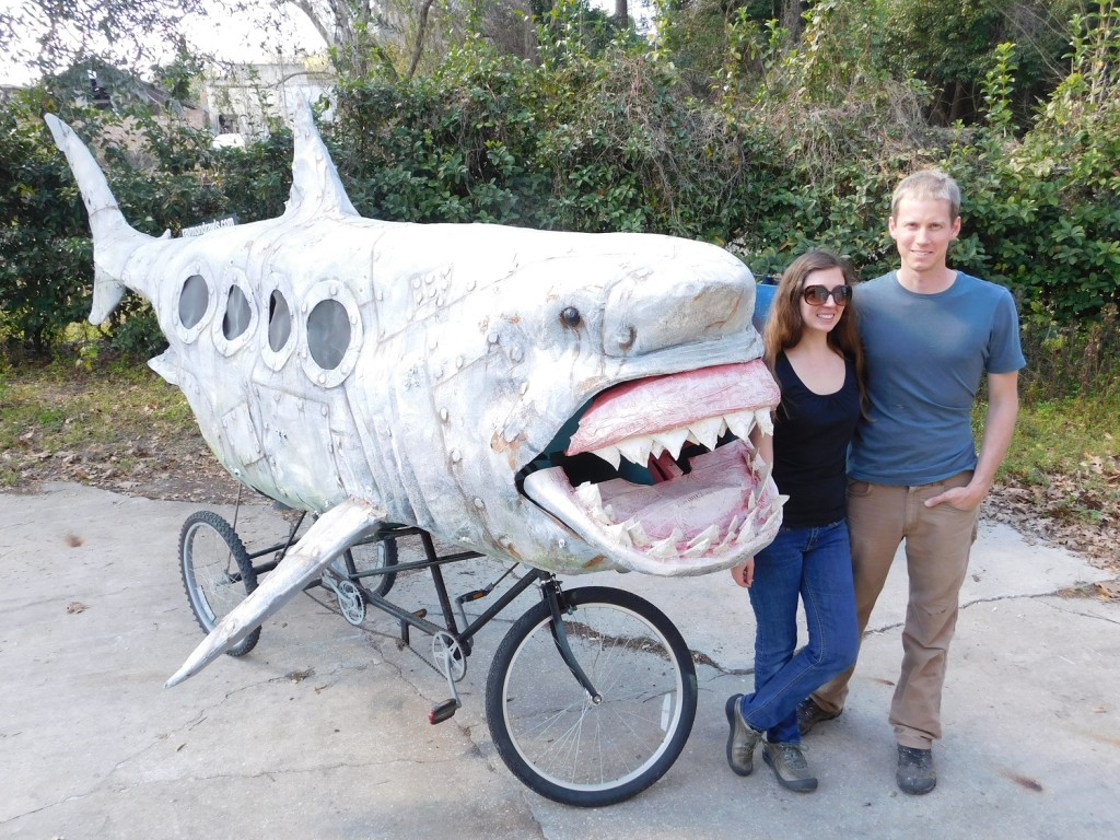 Lorraine Duerden and her husband Raymond Rawls stand in front of the Shark Bike they created. It will be on display tonight at the GRU Warehouse.
