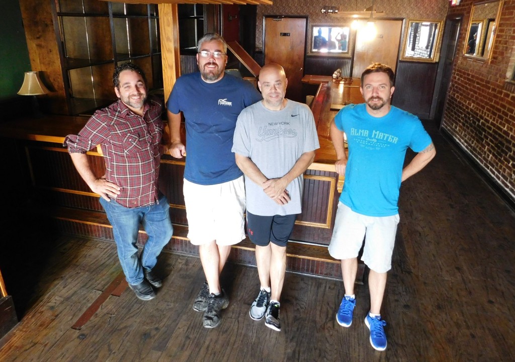 Dave Molyneaux, second from right, and his team at the Fish Hawk Tasting Room Photo by Gainesville Downtown)