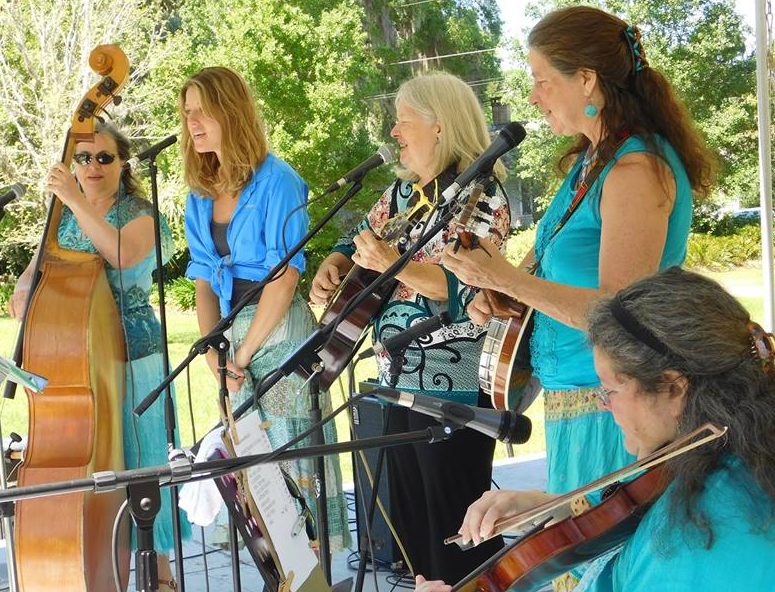 DeWitt, center, performs with her band Patchwork at the Santa Fe Springs Arts Festival. Photo by Gainesville Downtown)