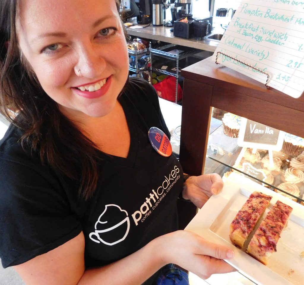 Erin Leigh Patterson holds the Lemon Loaf vegan option.