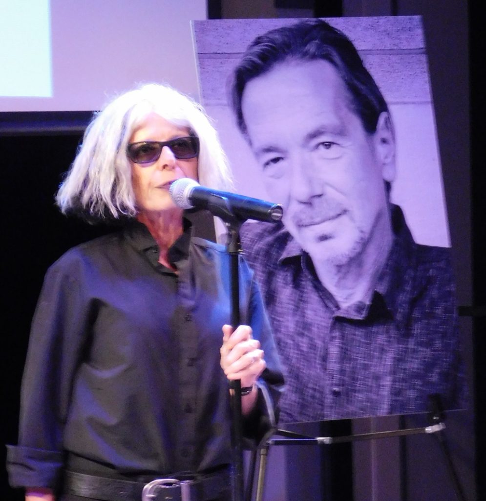 Hippodrome artistic director Lauren Warhol Caldwell shares a story about Rusty Salling. Photo by Gainesville Downtown)