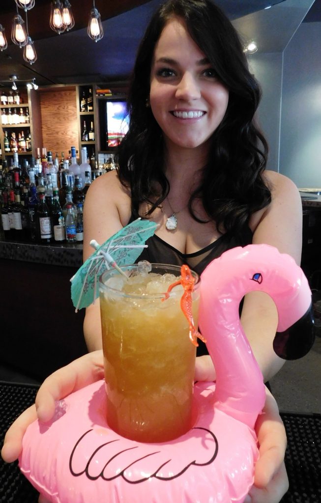 Bartender Katie Renfro serves up a Trailer Park Pool Party cocktail.
