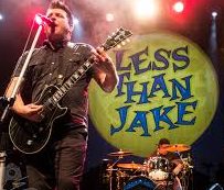 Chris DeMakes performs with Less Than Jake.